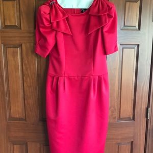 Semi-formal cocktail dress in strawberry red.
